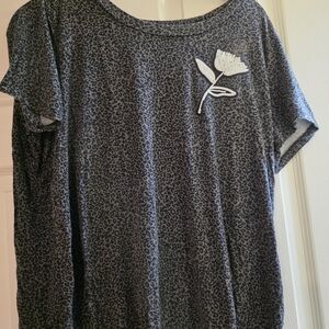 Elegant Black Leopard Print Tee with Floral Accent